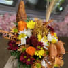 Bouquet of orange roses and mixed chrysanthemums with a ribbon bow