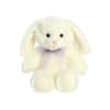 Cream-colored plush bunny with floppy ears and a light purple ribbon bow.