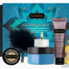 Travel gift kit with lotion, candle, scrub, oil, and a feather accessory
