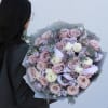 Large bouquet of blush and lavender roses with pale filler flowers