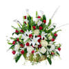 Basket arrangement of red roses and white calla lilies