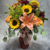 Embrace the beauty of fall with our exquisite fall arrangement!

Handcrafted with vibrant