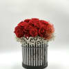 Gorgeous way to celebrate your love! Red roses arranged on a airy