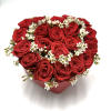 Heart shaped box filled with beautiful red roses! Delicate Baby Breath flowers