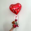 Red heart-shaped Valentine balloon with a rose and teddy bear