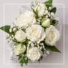 White rose bouquet with baby's breath and silver ribbon accents