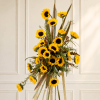 Standing spray of all sun flowers.


