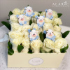 This box of white roses and miniature sheeps makes you go Oh