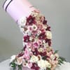 Mixed flowers arranged on a stand (any color of choice)