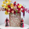 Mixed flowers arranged in handmade Armenian letter box