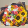 Bouquet of sunflowers, roses, and white daisies wrapped in dark paper