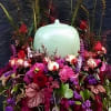 This beautiful urn arrangement brings a sense of tranquility and grace with