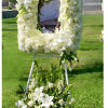 This exquisite, handcrafted floral tribute is a touching way to honor the
