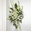 A refined standing spray designed in soft white, fresh green, and delicate