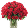 Bouquet of red roses in a clear glass vase