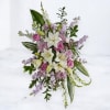 Bouquet of white lilies, pink roses, and lavender flowers