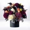 The Nocturne Bouquet is a bold, artful composition that blends rich tones