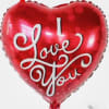 Red heart-shaped balloon with the words "I Love You"