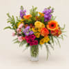 Colorful mixed bouquet in a clear glass vase