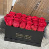 Box of red roses in a black gift box