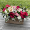 Mixed roses and baby's breath in a wooden box arrangement