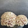 . A timeless arrangement featuring delicate blush roses, thoughtfully designed with elegant