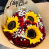 2 Dozen Red roses and 3 sunflowers (wrapped in paper) and baby