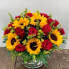 Sunflower Romance is a cheerful flower arrangement that pairs bold yellow sunflowers