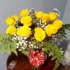 Dozen magestic yellow roses with babysbreath and leatherleaf, vased.&nbsp; Bow can be