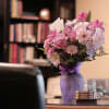 Beautiful lavender roses, white daisy and lovely purple and iveory accent flowers