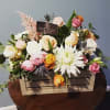 Beautiful arrangment of seasonal flowers in this soft but sophisticated pallet, white