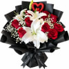 Bouquet of red roses and white lilies wrapped in black paper