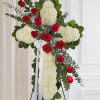 Standing floral cross with red roses and white chrysanthemums