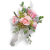Pink rose corsage with silver ribbon and rhinestone accents