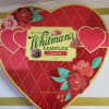 Heart-shaped Whitman's Sampler chocolate box with floral decoration