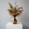 Made with preserved and dried foliage and blooms. Your order will be
