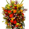 Large bouquet of orange, red, yellow, and white flowers