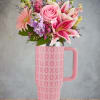 Pink and lavender bouquet in a pink XOXO tumbler vase
