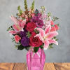 Big, blousy pink lilies take center stage in this Pink stardust flower