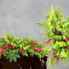 Lush green foliage takes center stage in this funeral service set, paired