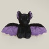 Black bat plush toy with purple wings on a plain background