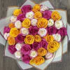 The Golden Petal Party is a bouquet that features a bright mix