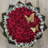The Butterfly Meadow consists of red roses centered within a ring of