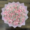 Pink rose bouquet with baby's breath wrapped in pink paper
