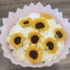 The Sun-Kissed Cloud features a dense collection of white roses interspersed with