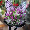 Purple tulip bouquet with white baby's breath and butterfly wings