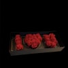 Red roses arranged in a black rectangular gift box