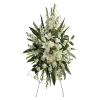 White floral standing spray with lilies and roses on a metal easel