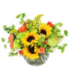 Sunflower bouquet with orange and green flowers in a glass vase