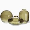 Our Small Bud Vases in moss green add a pop of personality